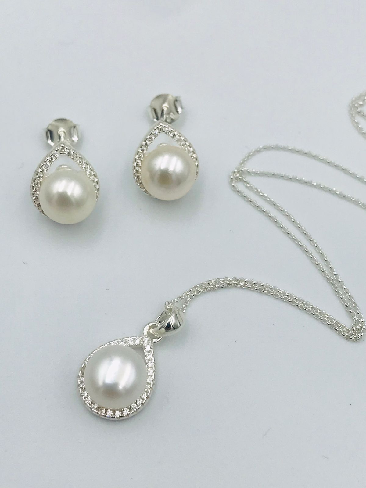 Juego de plata y perlas