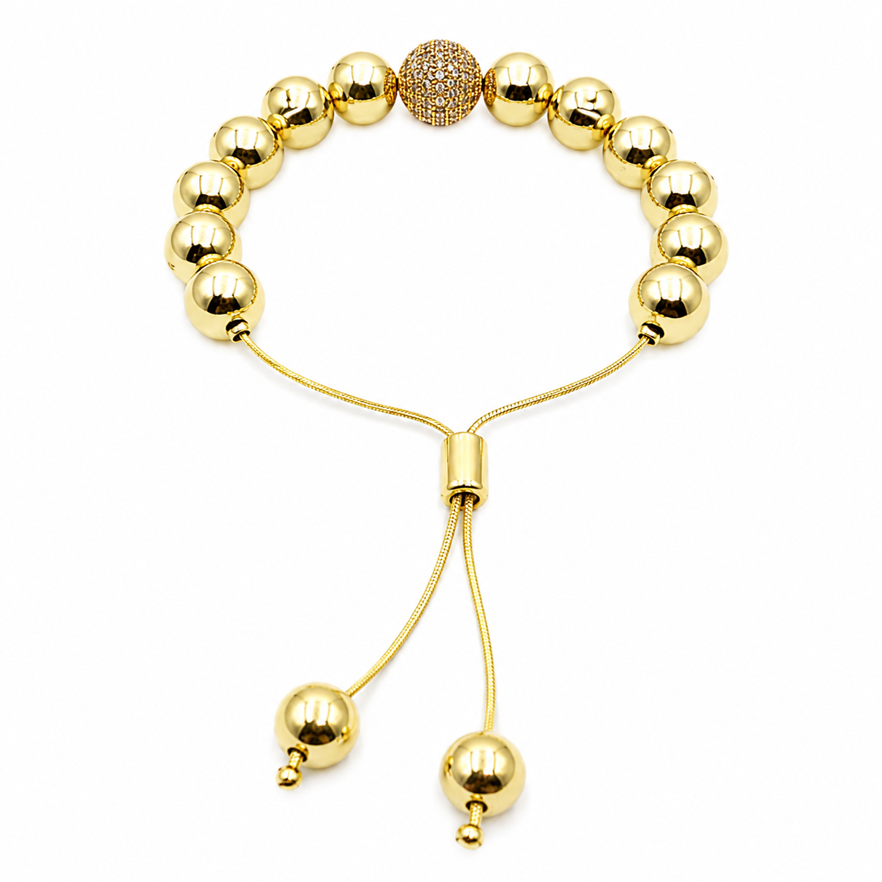 Pulsera ajustable Goldfilled y zirconias. Dorada.
