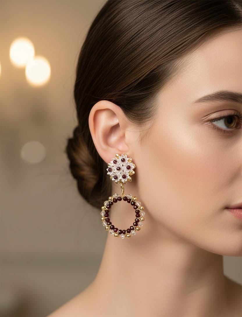 Aretes con cristales y piezas en acero.