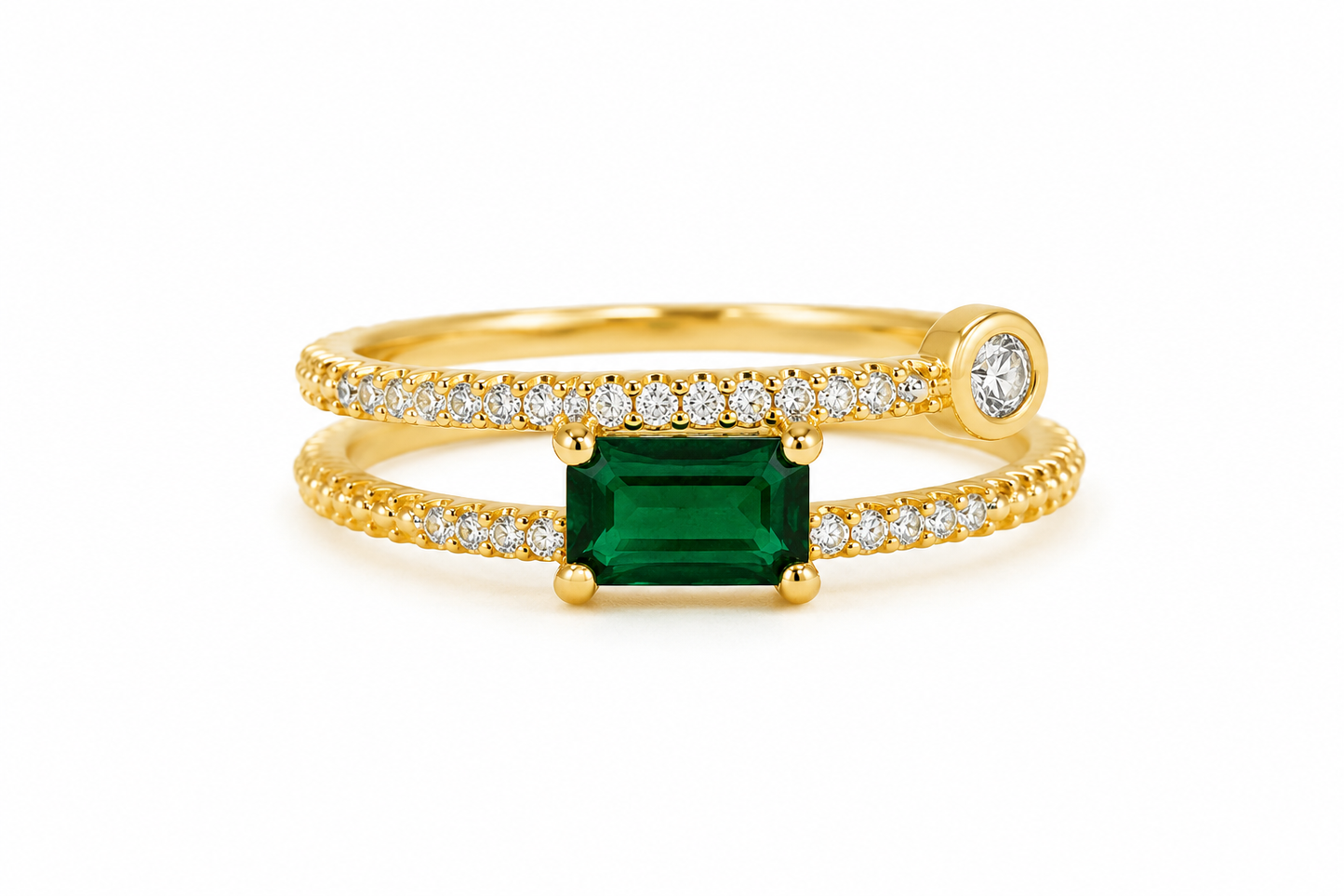Anillo ajustable con circonia central verde esmeralda y microcirconias.