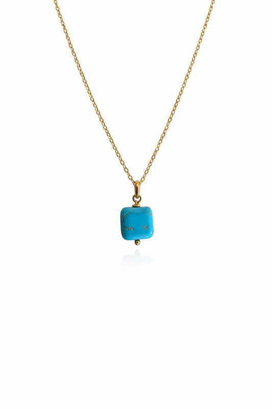 Collar de acero, color dorado, con dije azul