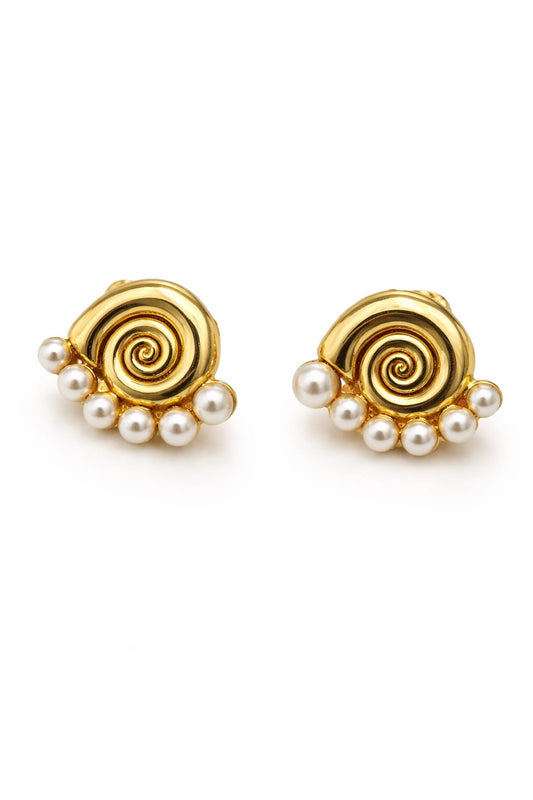 Aretes de acero y perlas